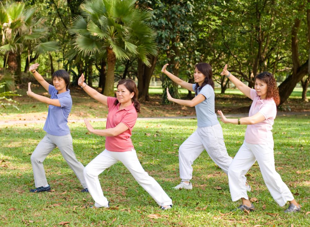Women practicing tai chi